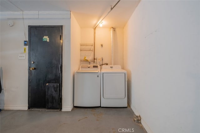 15053 Sherman Way Unit A, Van Nuys, CA 91405 - laundry room with washer and dryer and baseboards