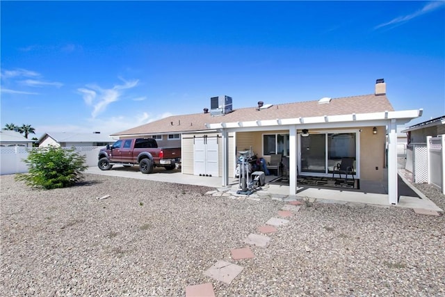 27218 Monk St, Menifee, CA 92586 - rear view of property featuring a patio area, a ceiling fan, and a chimney