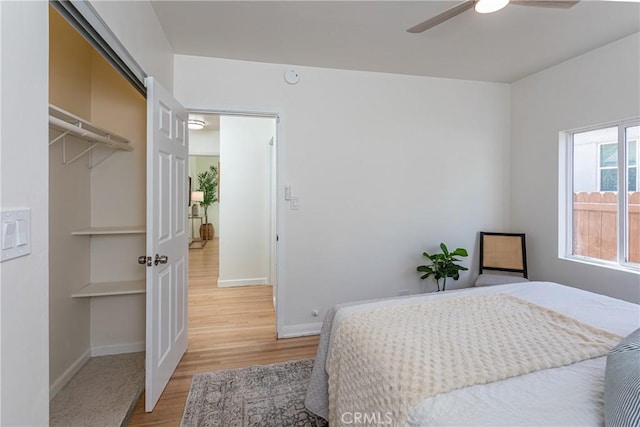 624 S Reese Pl, Burbank, CA 91506 - bedroom with light wood finished floors, a closet, and a ceiling fan