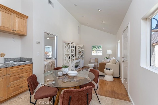 624 S Reese Pl, Burbank, CA 91506 - dining space with high vaulted ceiling and light tile patterned floors