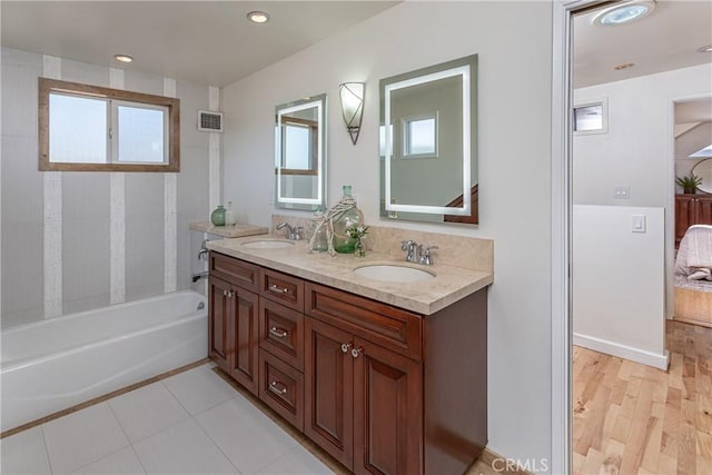624 S Reese Pl, Burbank, CA 91506 - full bath with double vanity, bathing tub / shower combination, ensuite bath, and recessed lighting