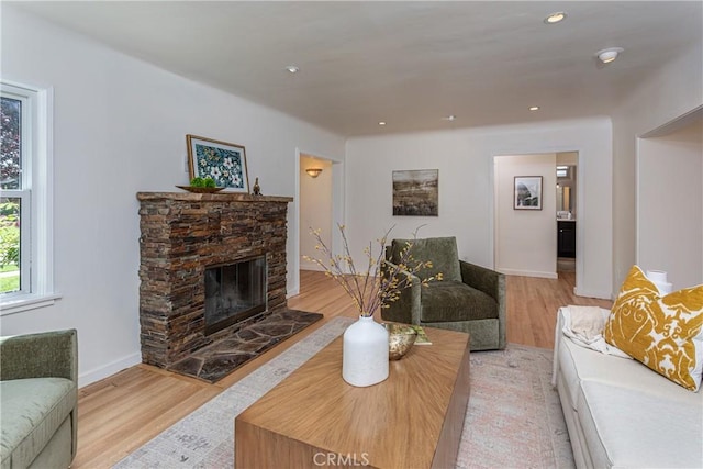 624 S Reese Pl, Burbank, CA 91506 - living area featuring light wood finished floors, a stone fireplace, and recessed lighting