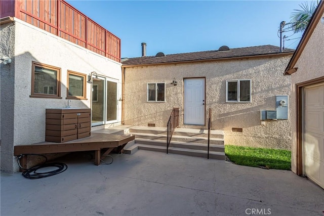 624 S Reese Pl, Burbank, CA 91506 - rear view of house with stucco siding and a patio area
