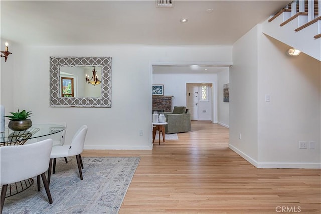 624 S Reese Pl, Burbank, CA 91506 - dining space featuring light wood-type flooring, plenty of natural light, recessed lighting, and stairs