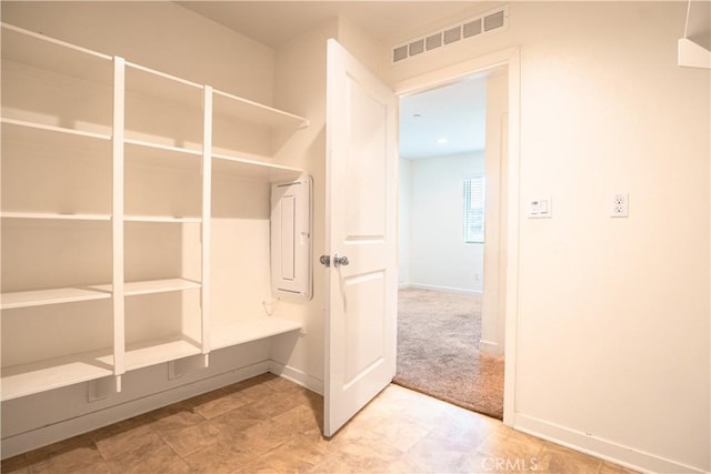 12893 Breccia Way, Moreno Valley, CA 92555 - mudroom featuring baseboards