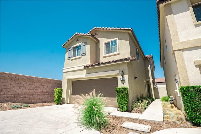 12893 Breccia Way, Moreno Valley, CA 92555 - view of front of house with an attached garage, stucco siding, a tiled roof, and concrete driveway