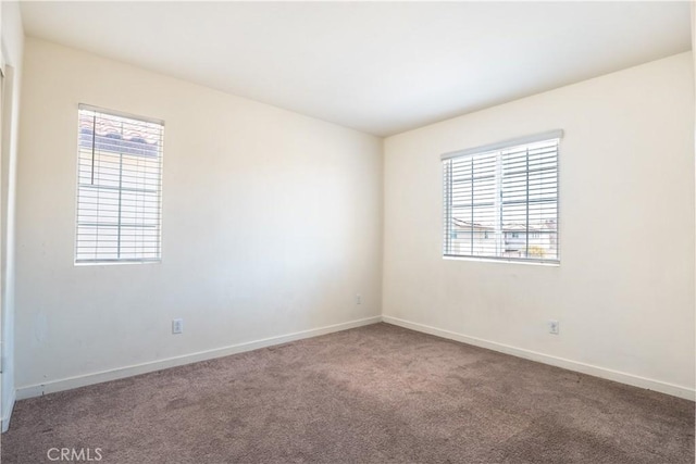 12893 Breccia Way, Moreno Valley, CA 92555 - carpeted empty room with healthy amount of natural light