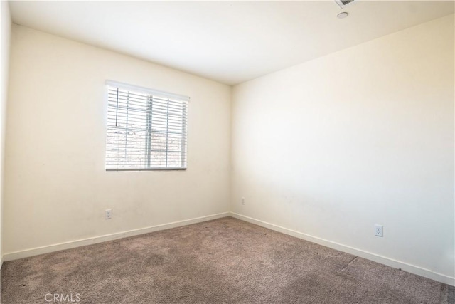 12893 Breccia Way, Moreno Valley, CA 92555 - empty room with carpet floors and baseboards
