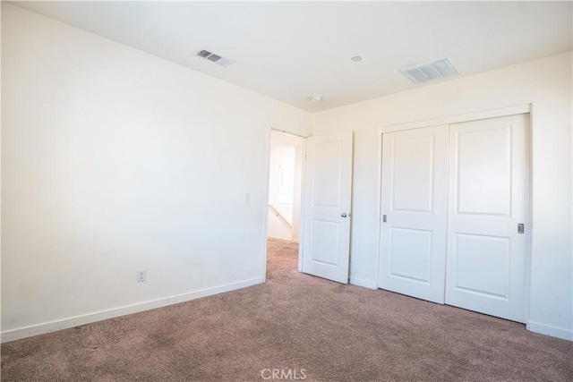 12893 Breccia Way, Moreno Valley, CA 92555 - unfurnished bedroom with carpet and a closet