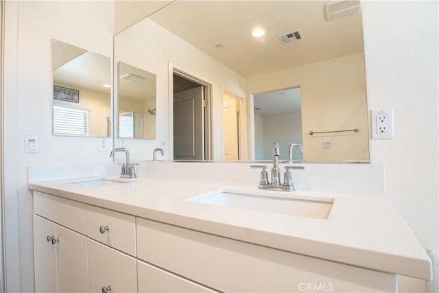 12893 Breccia Way, Moreno Valley, CA 92555 - full bathroom featuring double vanity