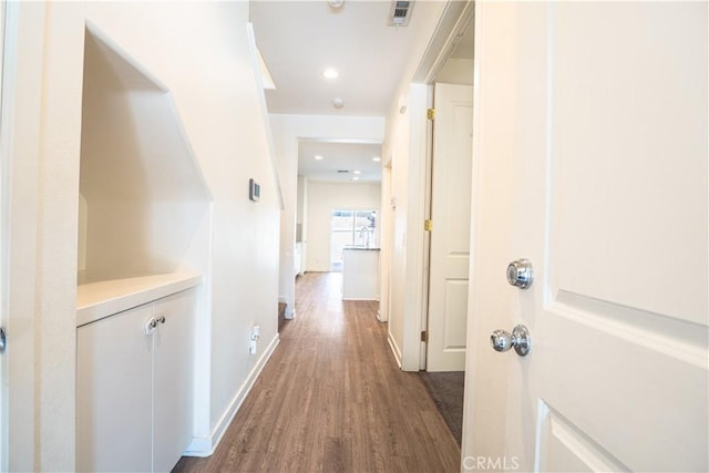12893 Breccia Way, Moreno Valley, CA 92555 - hallway featuring wood finished floors and recessed lighting