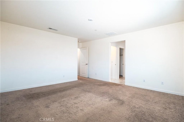 12893 Breccia Way, Moreno Valley, CA 92555 - empty room with baseboards and light colored carpet