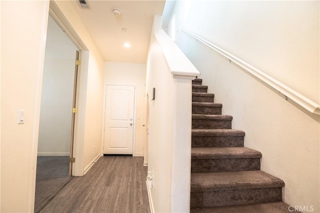 12893 Breccia Way, Moreno Valley, CA 92555 - stairs with wood finished floors and recessed lighting