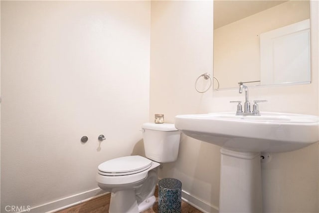 12893 Breccia Way, Moreno Valley, CA 92555 - bathroom featuring baseboards and wood finished floors