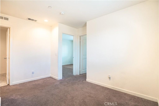 12893 Breccia Way, Moreno Valley, CA 92555 - spare room with carpet floors and a smoke detector
