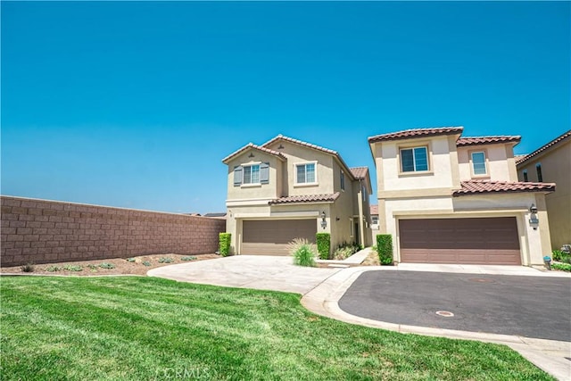 12893 Breccia Way, Moreno Valley, CA 92555 - view of front of property with an attached garage, stucco siding, concrete driveway, and a tiled roof