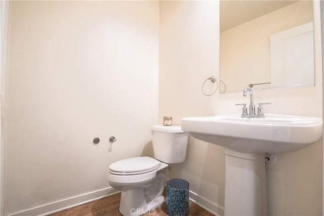 12893 Breccia Way, Moreno Valley, CA 92555 - bathroom featuring baseboards and wood finished floors