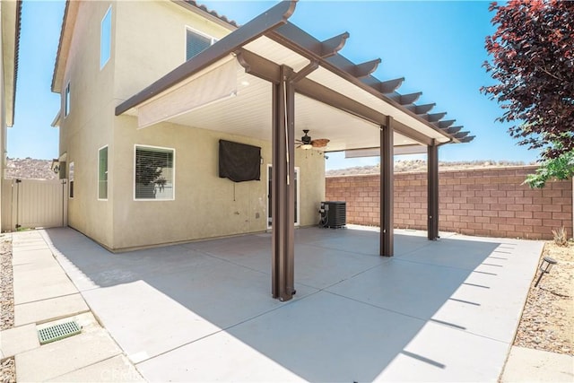 12893 Breccia Way, Moreno Valley, CA 92555 - fenced backyard with a ceiling fan and a patio