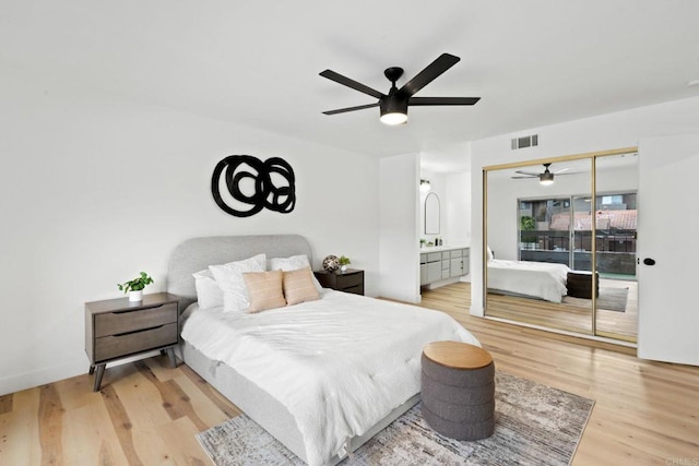 10350 Caminito Cuervo Unit 93, San Diego, CA 92108 - bedroom featuring light wood-style flooring and a ceiling fan
