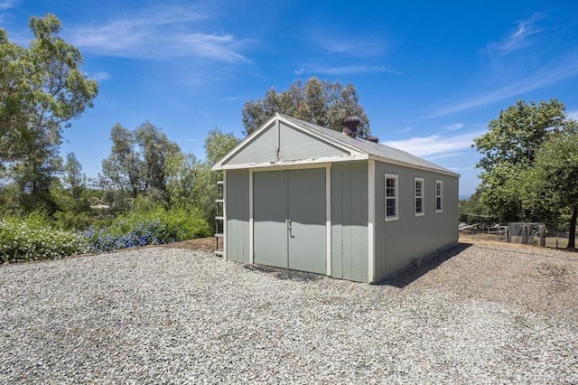 15935 Mac Tan Ln, Valley Center, CA 92082 - garage featuring a storage unit