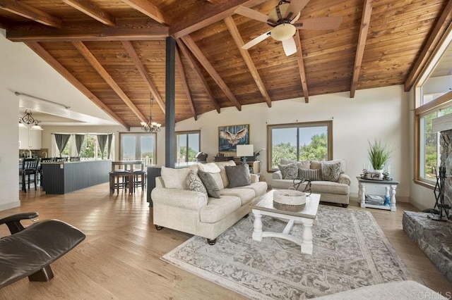 15935 Mac Tan Ln, Valley Center, CA 92082 - living area with a wood ceiling with exposed beams, wood finished floors, a chandelier, ceiling fan, and high vaulted ceiling