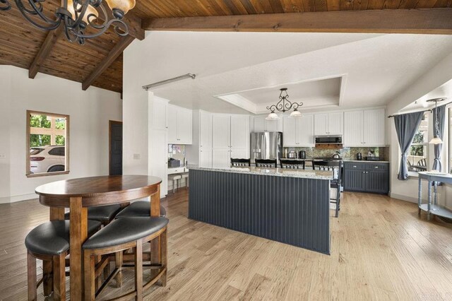 15935 Mac Tan Ln, Valley Center, CA 92082 - kitchen featuring appliances with stainless steel finishes, a chandelier, white cabinets, and wood ceiling