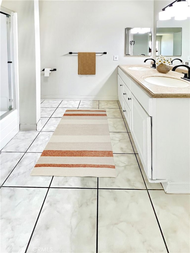 13895 Parkway Dr Unit 79, Garden Grove, CA 92843 - bathroom featuring double vanity and a shower