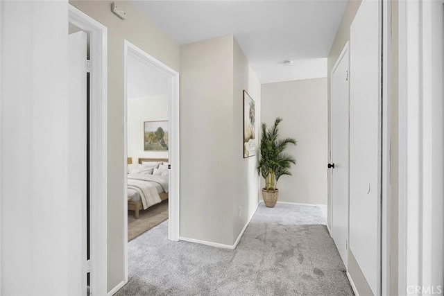 13895 Parkway Dr Unit 79, Garden Grove, CA 92843 - corridor featuring carpet floors and baseboards