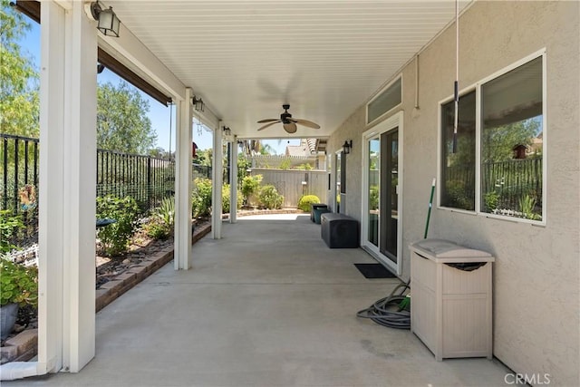 23998 Via Astuto, Murrieta, CA 92562 - fenced backyard with a ceiling fan and a patio area