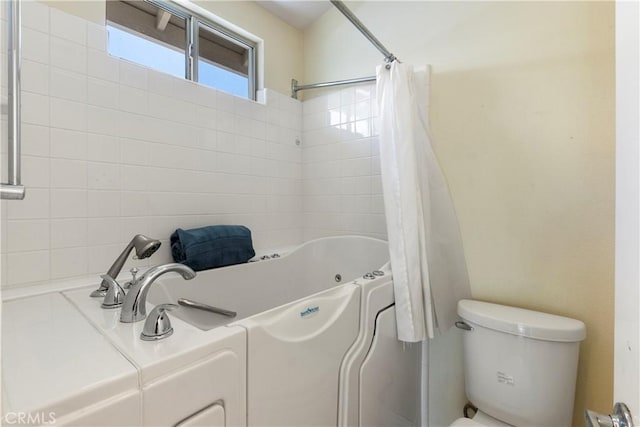 23998 Via Astuto, Murrieta, CA 92562 - bathroom featuring toilet and shower / bath combination with curtain