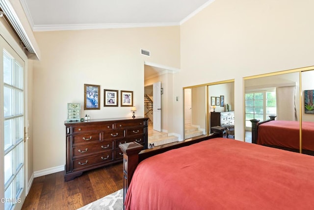 2274 Via Tomas, Camarillo, CA 93010 - bedroom with multiple closets, dark wood-type flooring, ornamental molding, and a high ceiling