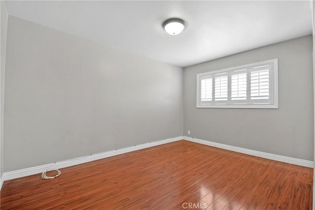 6433 San Marcos Way, Buena Park, CA 90620 - empty room with wood finished floors and baseboards