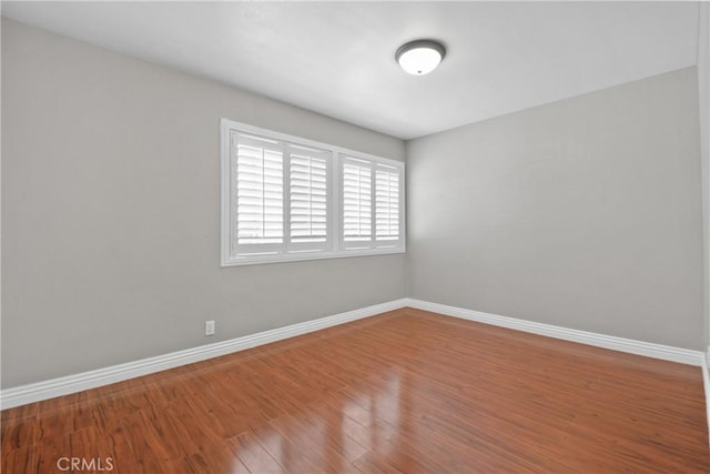 6433 San Marcos Way, Buena Park, CA 90620 - empty room featuring baseboards and wood finished floors