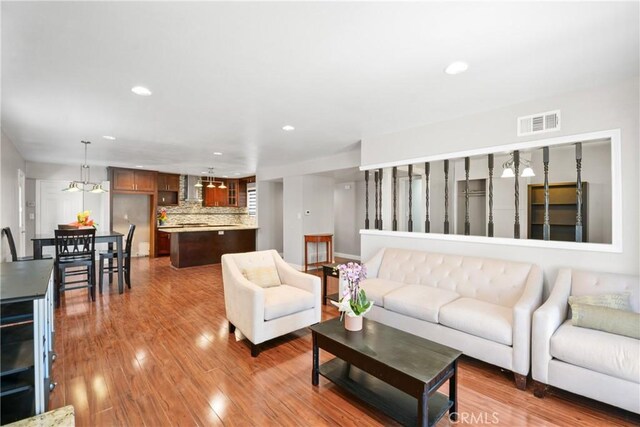 6433 San Marcos Way, Buena Park, CA 90620 - living area with recessed lighting and wood finished floors