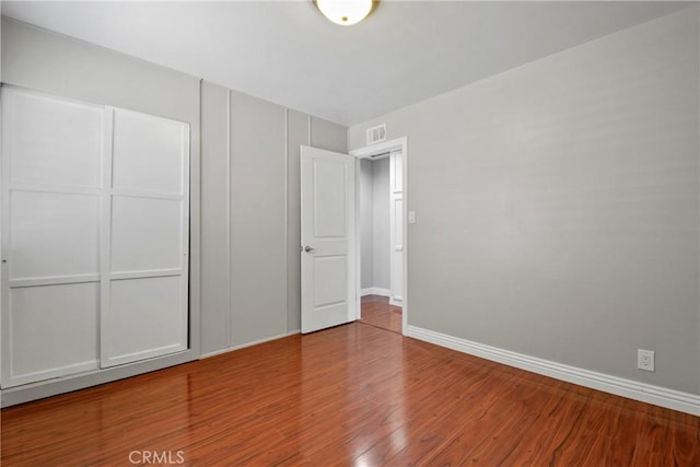 6433 San Marcos Way, Buena Park, CA 90620 - unfurnished bedroom featuring wood finished floors and a closet