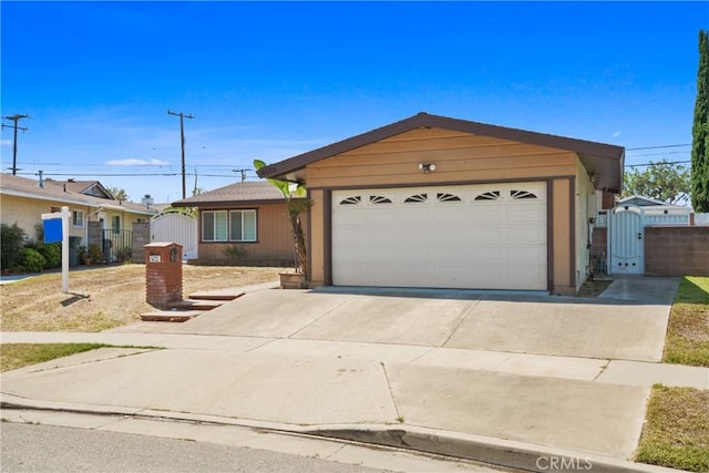 6433 San Marcos Way, Buena Park, CA 90620 - single story home featuring a gate, concrete driveway, and an attached garage