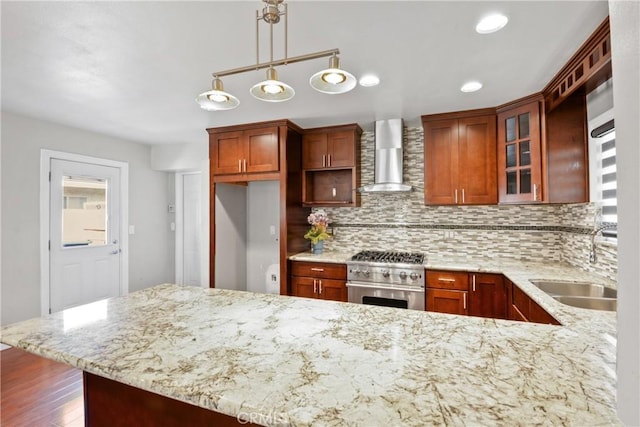 6433 San Marcos Way, Buena Park, CA 90620 - kitchen featuring stainless steel stove, wall chimney exhaust hood, backsplash, light stone countertops, and recessed lighting
