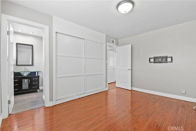 6433 San Marcos Way, Buena Park, CA 90620 - unfurnished bedroom with wood finished floors and a closet