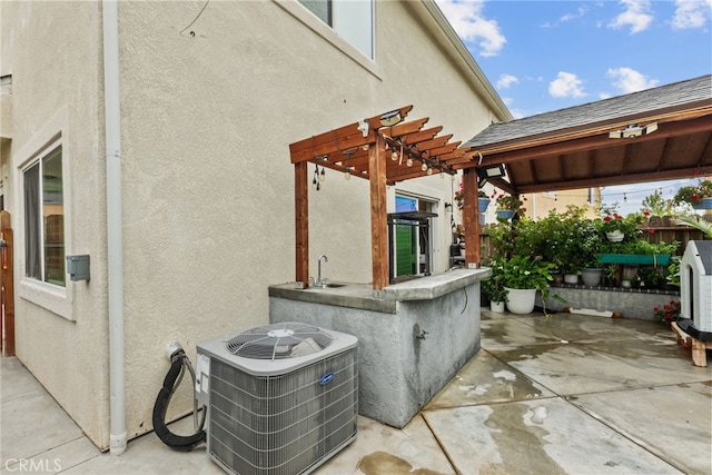 26120 Goldman Pl, Saugus, CA 91350 - view of patio / terrace featuring a pergola and a sink