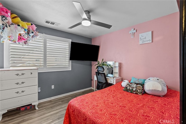 26120 Goldman Pl, Saugus, CA 91350 - bedroom with wood finished floors and a ceiling fan