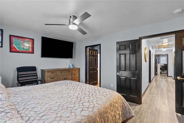26120 Goldman Pl, Saugus, CA 91350 - bedroom featuring light wood-style flooring and ceiling fan