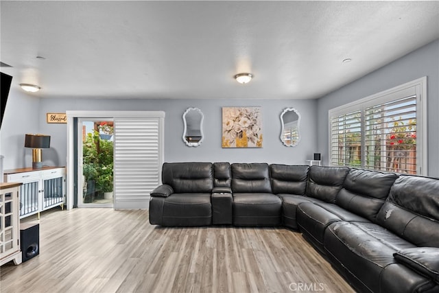 26120 Goldman Pl, Saugus, CA 91350 - living room featuring plenty of natural light and wood finished floors