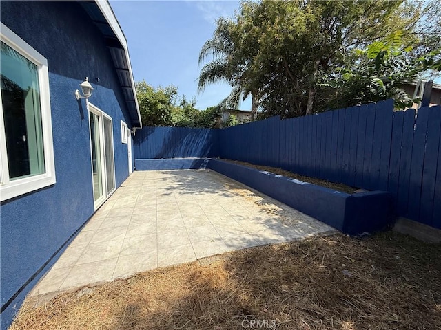 7712 Young Ave, Rosemead, CA 91770 - fenced backyard featuring a patio area
