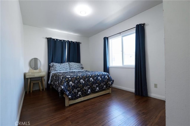 7712 Young Ave, Rosemead, CA 91770 - bedroom with wood finished floors and baseboards