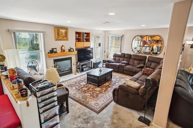 29720 Creekbed Rd, Castaic, CA 91384 - living area with healthy amount of natural light, a tiled fireplace, carpet flooring, and recessed lighting