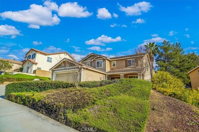 29720 Creekbed Rd, Castaic, CA 91384 - view of front of property with a garage and stucco siding