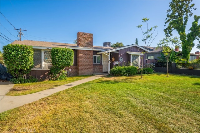 950 E Yale St, Ontario, CA 91764 - view of front of house featuring a chimney and brick siding