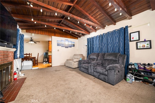 950 E Yale St, Ontario, CA 91764 - living room with wood ceiling, carpet flooring, ceiling fan, a fireplace, and track lighting