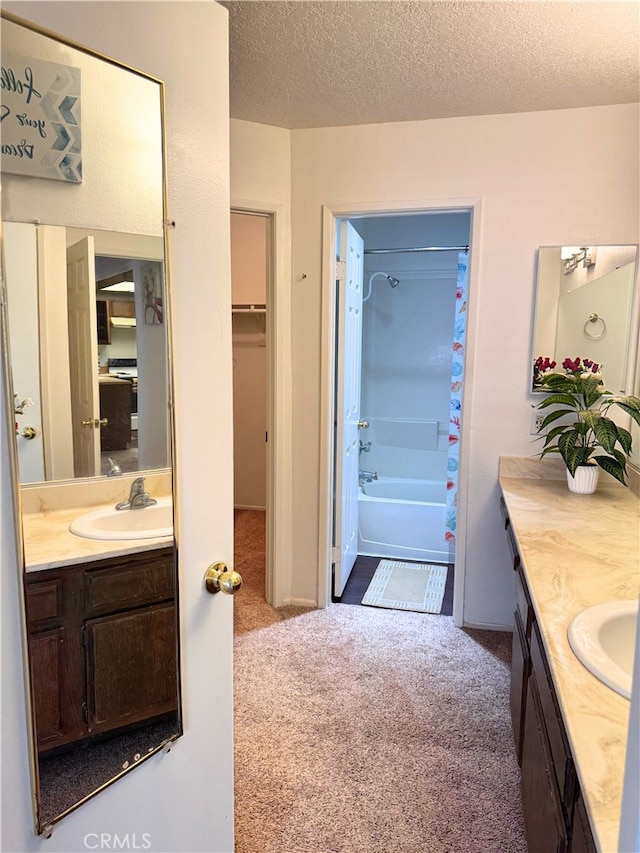 1480 W Edgehill Rd Unit 58, San Bernardino, CA 92405 - full bath with vanity, shower / tub combo with curtain, and a textured ceiling