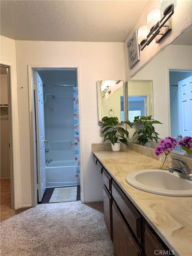 1480 W Edgehill Rd Unit 58, San Bernardino, CA 92405 - full bath featuring vanity, shower / tub combo with curtain, and a textured ceiling